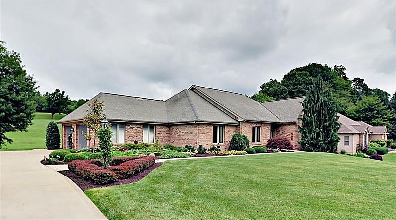 Custom built ranch on meticulously landscaped 1/2 acre home site.