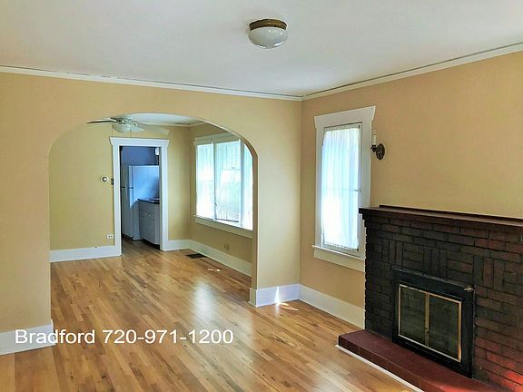 Living room and dining room , decorative fireplace