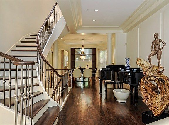 Long shot from living room looking toward back of home