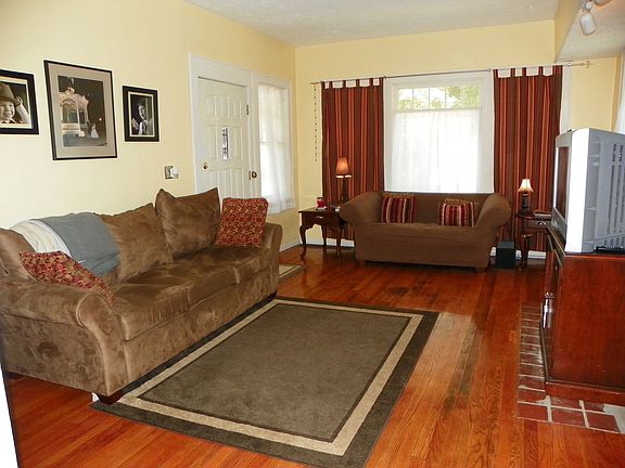 Living Room w Handfinished hardwoods and picture window
