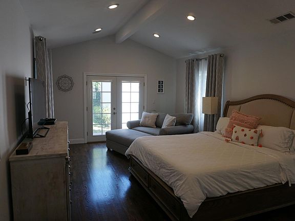 Master Bedroom, features an ensuite bathroom, his and hers c