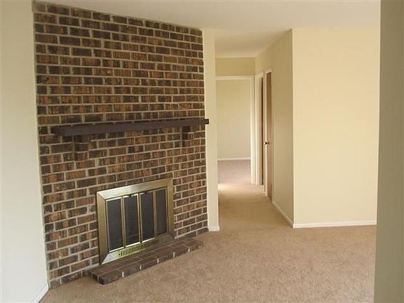 Living Room With Brick Fireplace