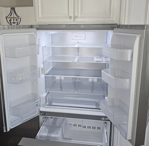New refrigerator with interior water filling station