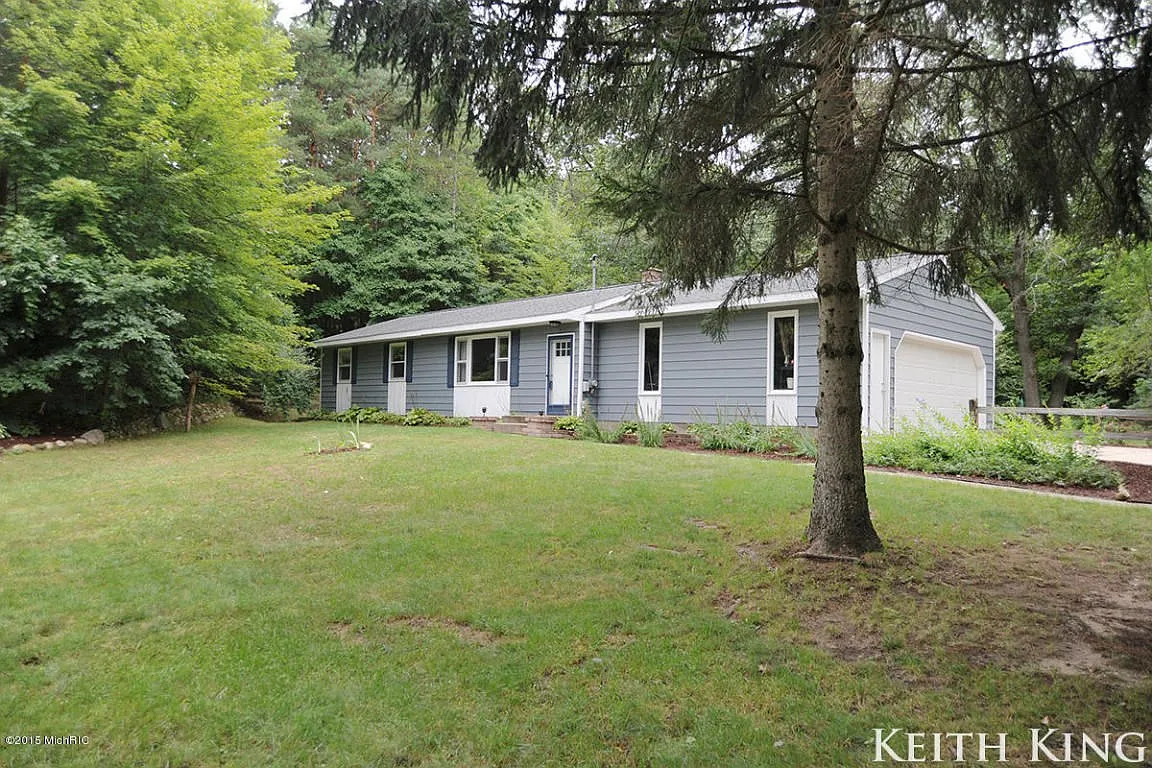 3161 Thirteen Mile Rd NE photo 1