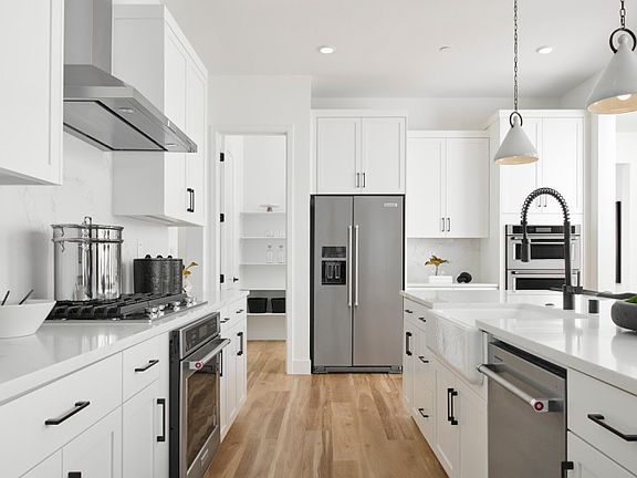 Open kitchen with decorative lighting