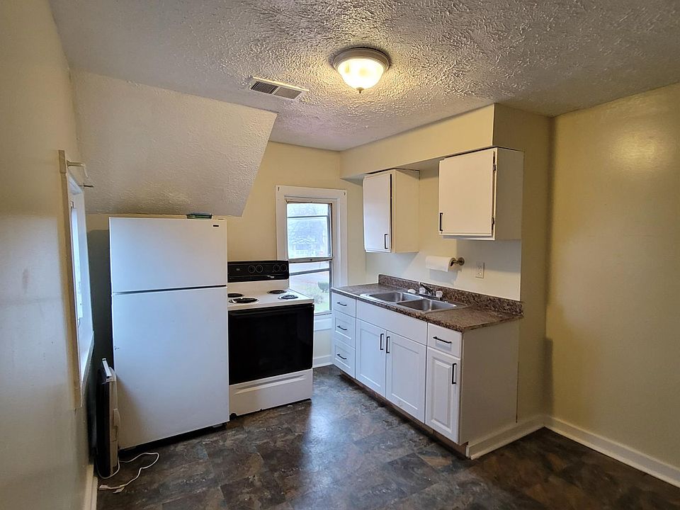 Freshly painted kitchen, new counter and sink