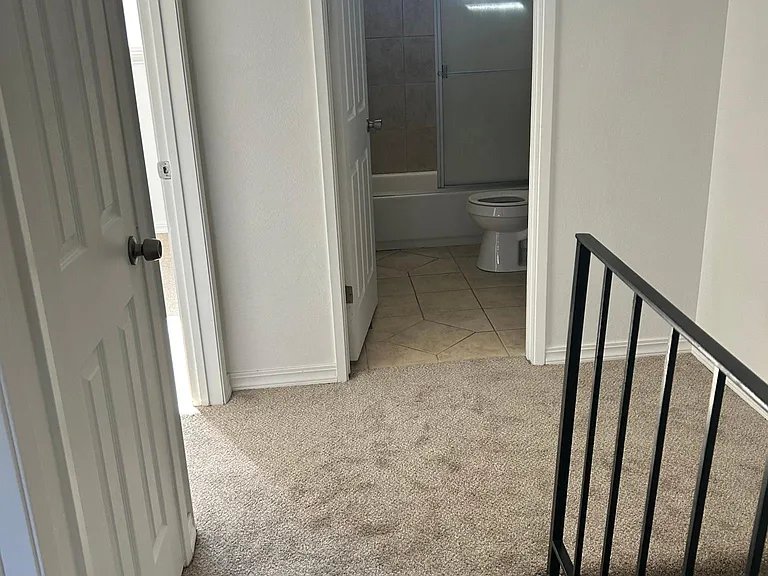 hallway in 2nd floor/2 bedrooms and 1 full bath. 2nd floor as newly installed carpet.