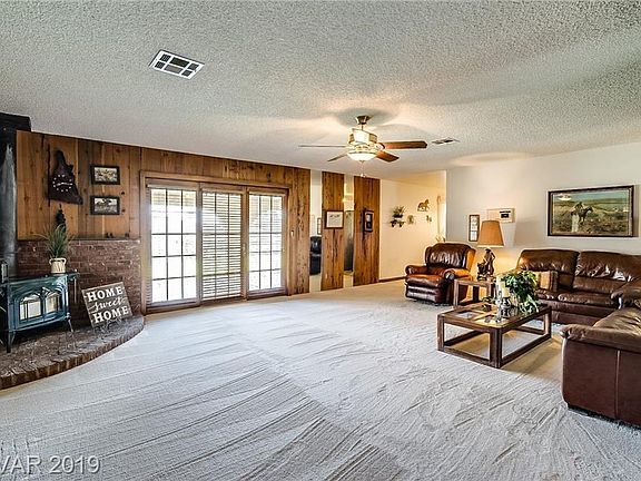 Large Family Room with Wood Burning Fireplace.