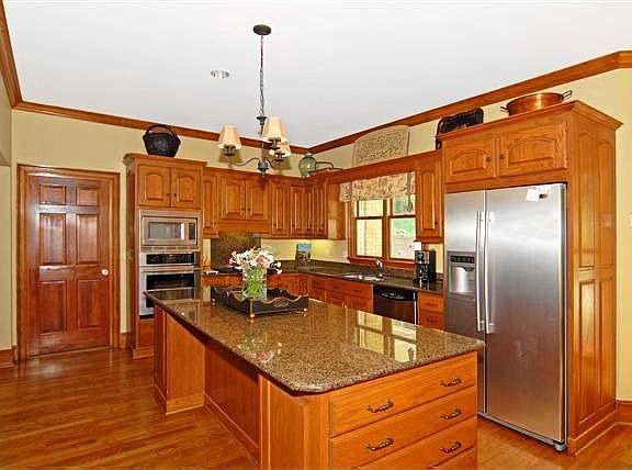 Kitchen with Island and SS Appliances
