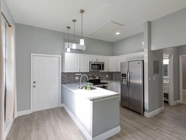13428 87th St N #GUEST HOUSE — Photo 1