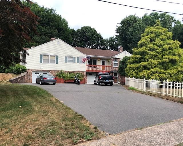 Driveway first left on Round Hill Road