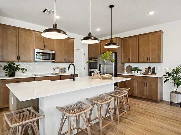 Kitchen with center island and pendant lighting