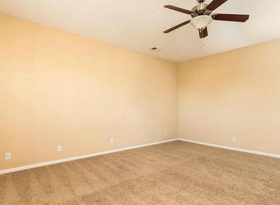 Spacious living room is approx. 18' x 14'.