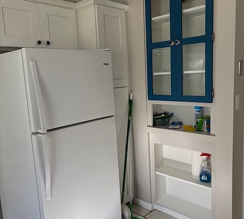 Refrigerator with custom cabinets