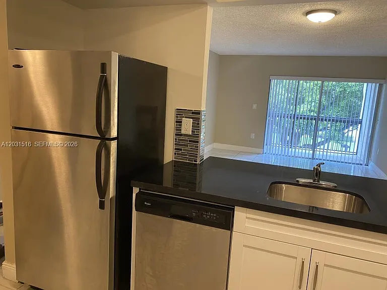 721 N Pine Island Rd #304 — Photo 3