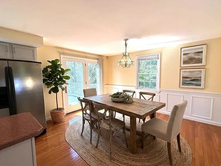 Virtually Staged. The main floor offers a formal living room with decorative fireplace, formal dining room, and cozy family room. The bright eat-in kitchen boasts stainless steel appliances, a BUILT-IN DESK, and sliders to a private deck and yard.