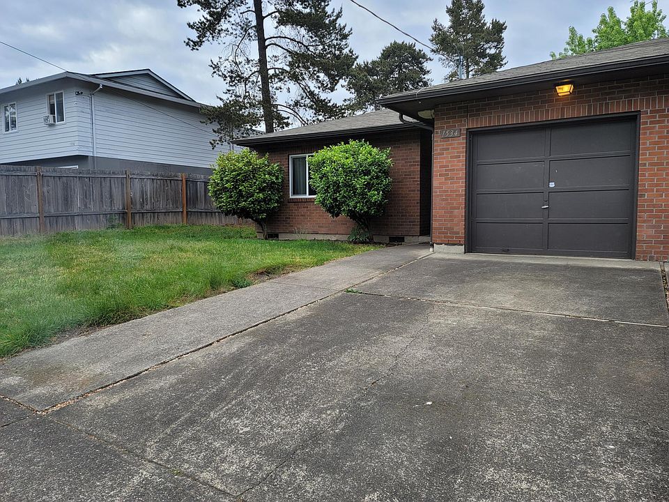 front entry, one car garage and driveway