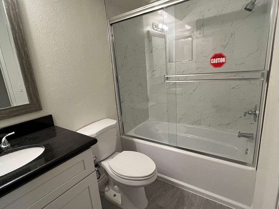 Newly renovated shower tub in bathroom 1.