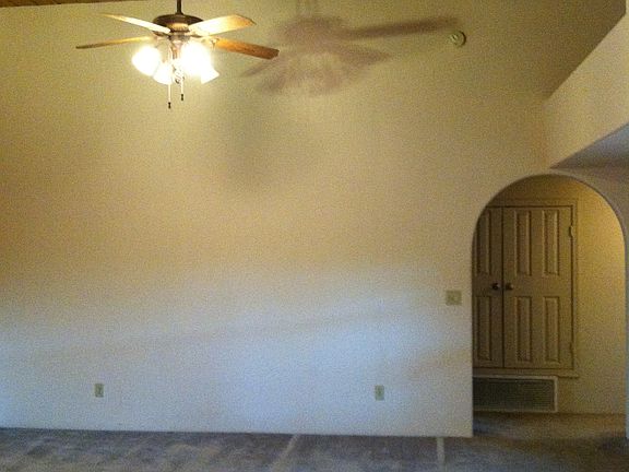 Living Room with Arch to 2 Bedrooms