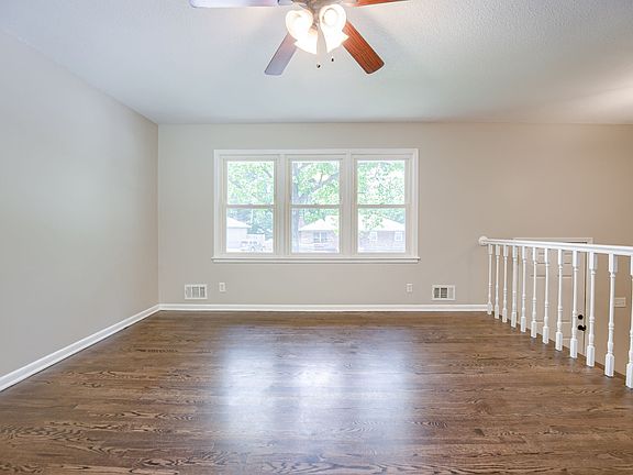 Living Room windows overlooking the front yard and street