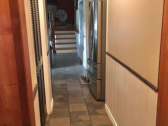 Laundry room on the left