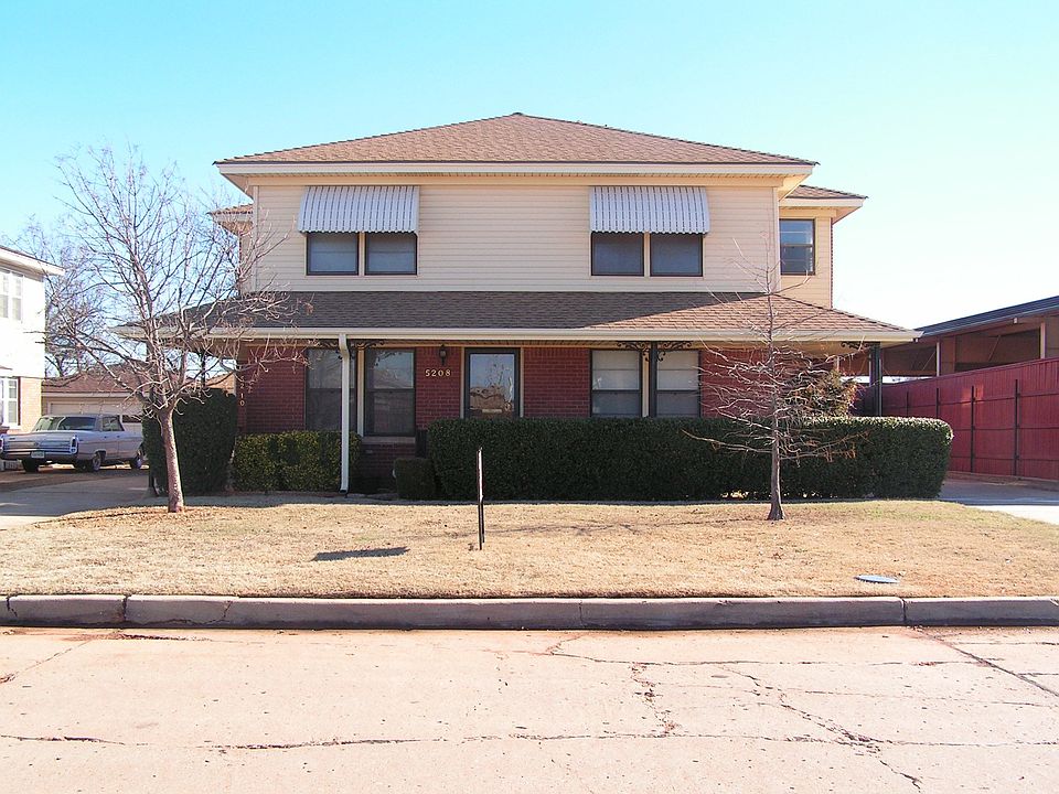 upstairs unit has private entrance on north side