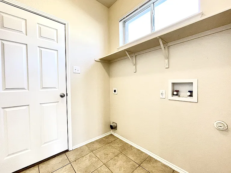 Mudroom with laundry hook-ups, and pantry