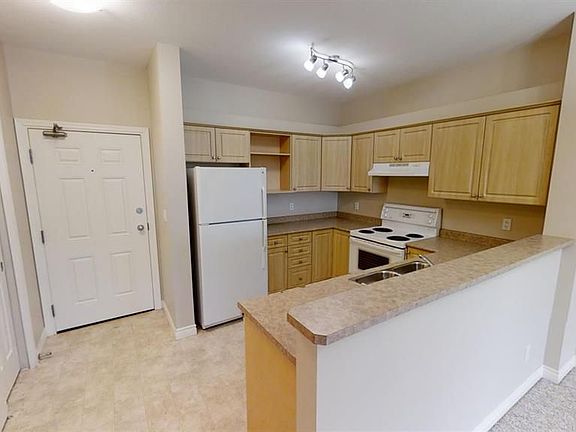 2nd image of 9914 101st Ave #404