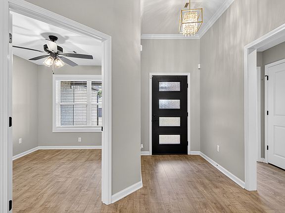 Front entry area, office is on the left, hallway on the right gives access to 1 bedroom, 1 bathroom, storage closet, and master