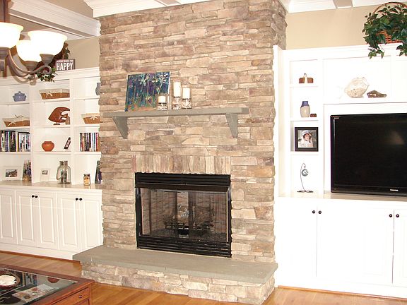 stone fireplace w/ gas logs