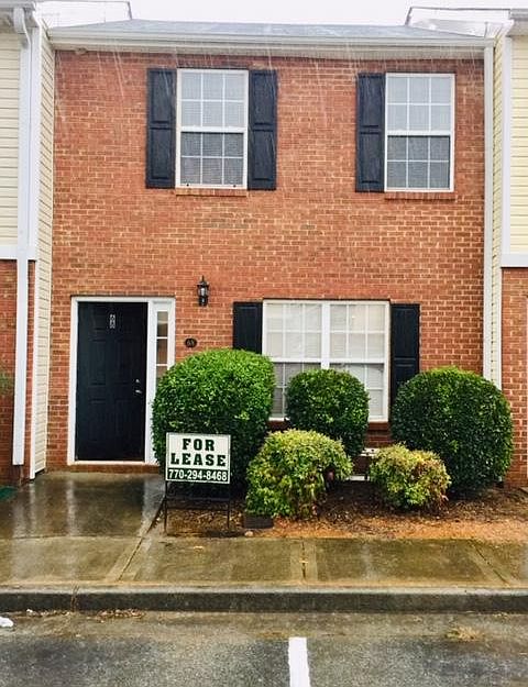 Front Elevation - Two parking spaces in front of unit