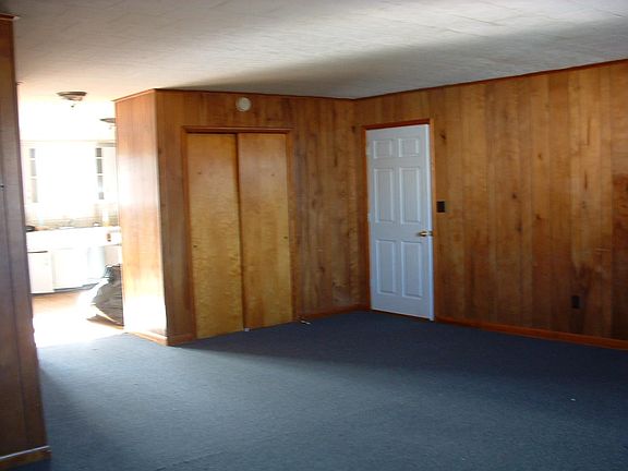 LIVINGROOM WITH DOOR TO HALL