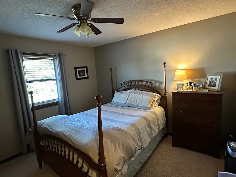 Bedroom number two enjoys beautiful morning sunrise views and is located directly across the hall from the primary bedroom, making it ideal for family, guests, or even a comfortable home office space.