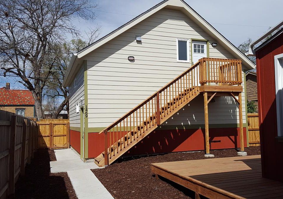 Private entry to carriage house in shared, sunny yard (view
