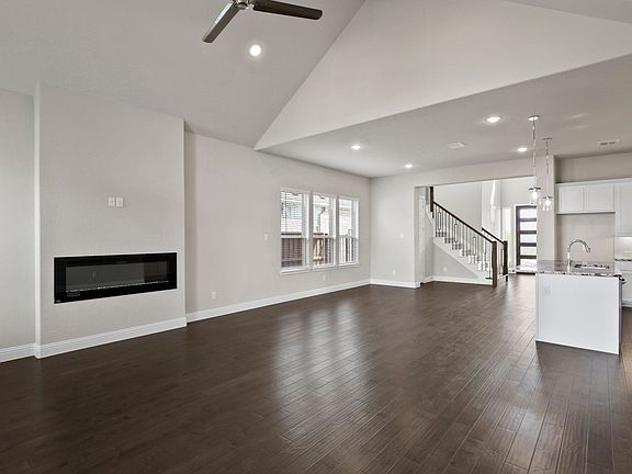 Living room in the Fairmont home plan by Trophy Signature Homes