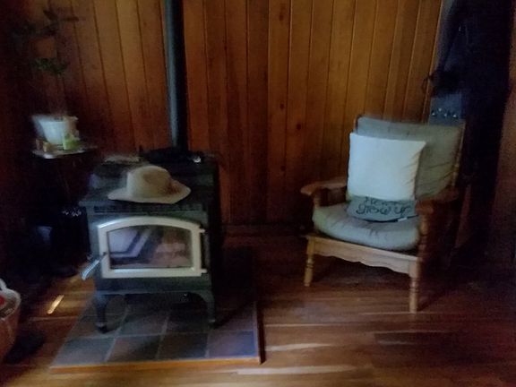 Sit by the wood stove