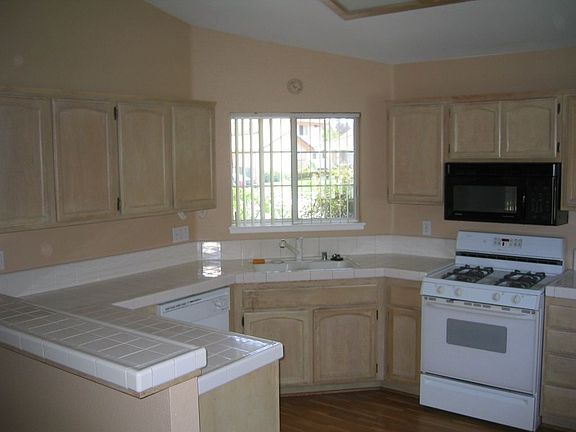 Newer appliances, open ceiling!