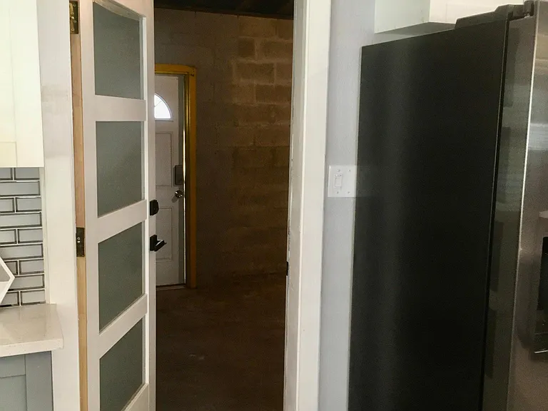 Door to large one-car garage