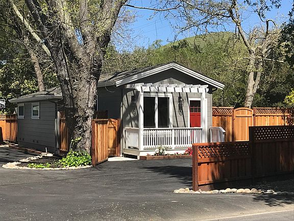 Beautiful Tree Covered Setting on a Mature Landscaped Lot