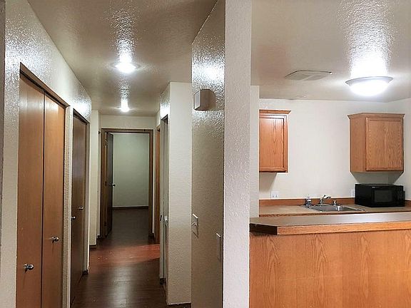 2 hallway closets to the left