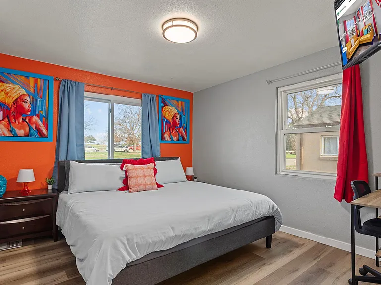 Experience the best of both worlds in our room with a king-sized bed, a desk and chair for work or study, and a smart TV for your leisure.