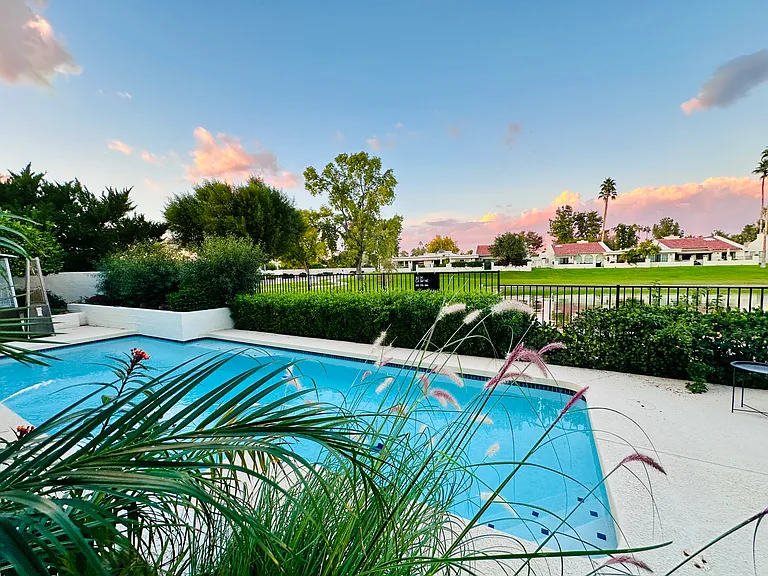 Backyard of the house with swimming pool.