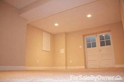 Family Room
						:
						New Family Room on Lower Level. Cozy with new carpet and access to back yard.
