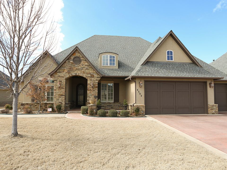 Brick & Stucco Professionally Landscaped Home