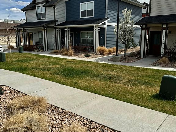 Walkway from porch to garage and parking