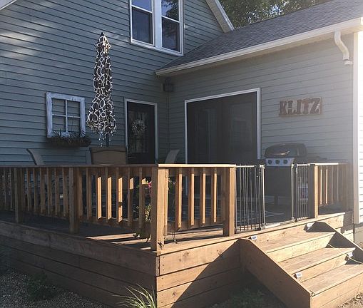 Back Deck
						:
						New built & stained, back door enters to kitchen, sliding doors enter to bdrm