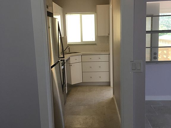 View of kitchen from dining area