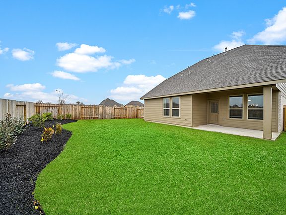 Yard with covered patio