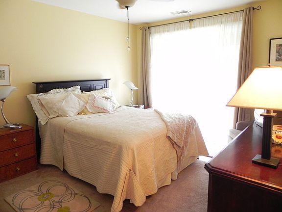 Master bedroom with dressing area and walk-in closet