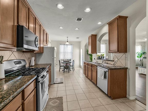 3rd image of 13615 Northpointe Ridge Ln